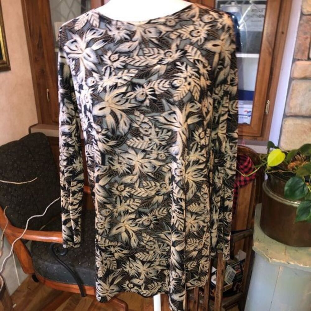 Size Large unbranded beautiful black with tan 3/4 sleeve partly sheer top